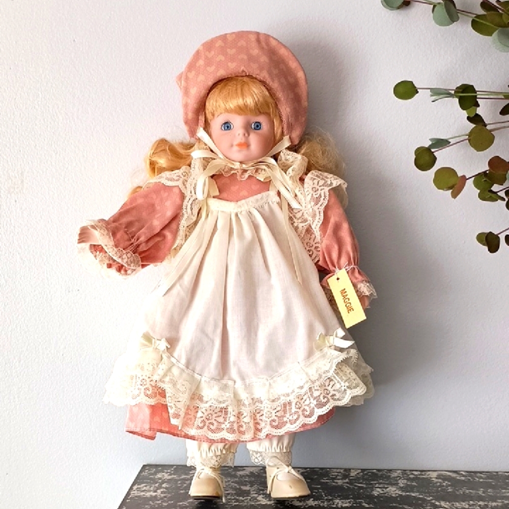 Vintage Porcelain Doll with Pink Dress and Bonnet by Dynasty Dolls